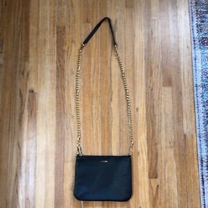 Lodi’s black leather convertible purse